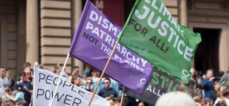 Climate justice protest signs