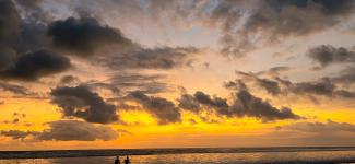 Exchange friends on a sunset swim at Canggu Beach in Bali (photo: Izzie Bjonness-Jacobsen)